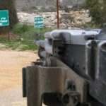 File photo of border of Israel and Lebanon taken in 2007. Hebrew signs say "No entrance, closed military area", and "Stop, border ahead". (Photo: Wikimedia)