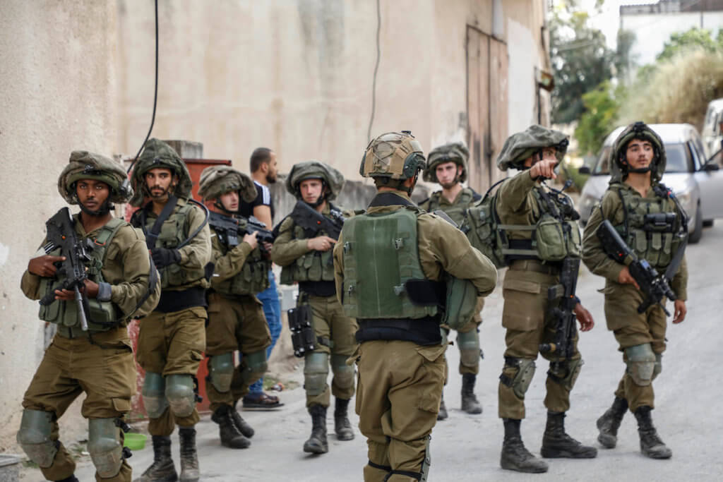 Israeli forces on patrol near the West Bank city of Jenin in May 2020. (Photo: Oday Daibes/APA Images)