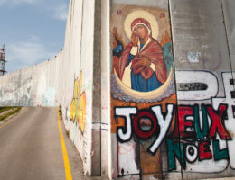 An icon of Mary is painted on the Israeli separation wall in the West Bank town of Bethlehem.