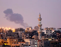 Smoke rises in the distance after the Israeli army carried out airstrikes over Khan Yunis in the southern Gaza Strip early morning on August 21, 2020. Israeli planes launched raids against Gaza late on August 20 in response to rocket fire, security sources in the Palestinian enclave said. (Photo: Ashraf Amra/APA Images)