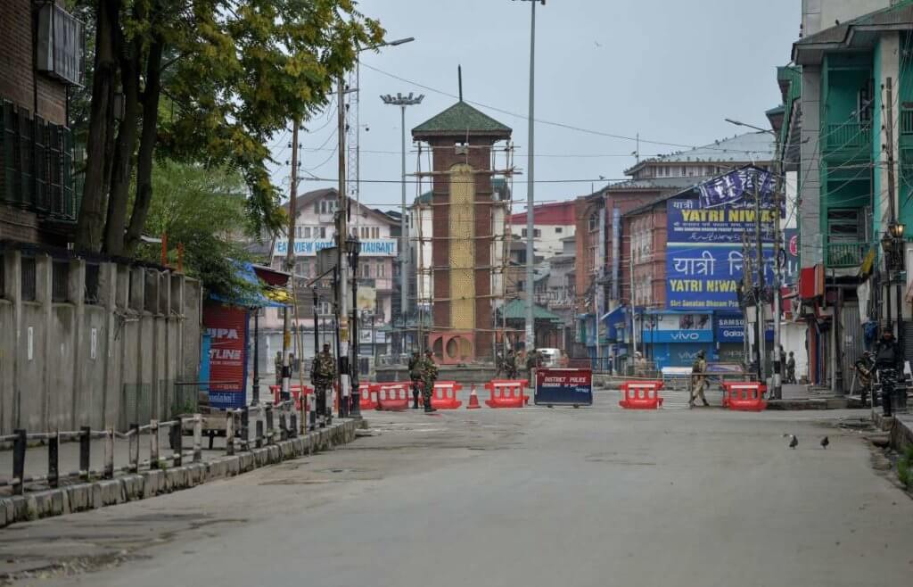 Security personnel stand guard near a clock tower in Lal Chowk during a lockdown in Srinagar in Jammu and Kashmir on August 15, 2019, as India celebrates its 73rd Independence Day. (Photo: Sajjad Hussain/ AFP/Getty Images)