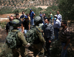 Palestinian demonstrators confront Israeli soldiers during a demonstration against Israel's planned annexation of parts of the occupied West Bank in the town of Beita, south of the West Bank city of Nablus on July 18, 2020. (Photo: Shadi Jarar’ah/APA Images)