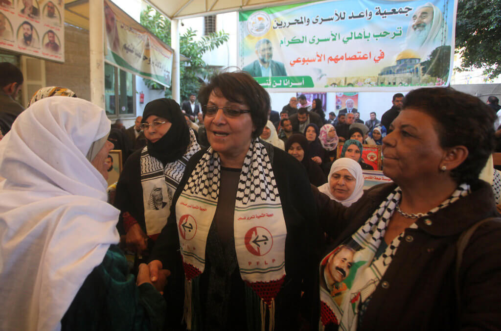 Leila Khaled participates in a demonstration at the headquarters for the International Committee for the Red Cross in Gaza City on December 10, 2012. (Photo: Ashraf Amra/APA Images)