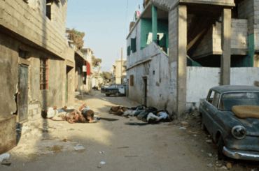 Palestinian refugees massacred by the Christian Lebanese Forces between September, 14 and 17. The Israeli army, positioned around the two camps, did not react. Corpses of refugees lie on the ground. (Photo: Michel Philippot/Sygma/ Getty Images)