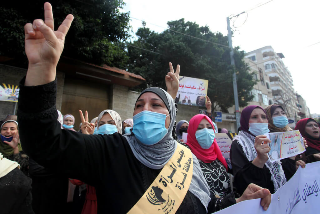 Palestinian protest in support of Maher Al-Akhras, a Palestinian prisoner on hunger strike detained by Israel, in front of Red Cross office in Gaza City on October 12, 2020. (Photo: Mahmoud Ajjour/APA Images)