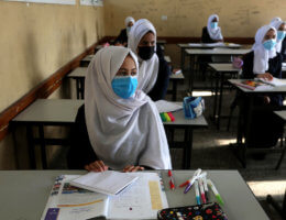 Palestinian students wear face masks during class as schools partially reopened amid the coronavirus pandemic in Deir al-Balah in central Gaza on October 28, 2020. (Photo: Ashraf Amra/APA Images)