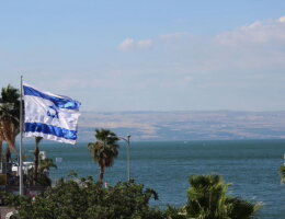 An Israeli flag flying over Lake Tiberias in the Galilee. (Photo: Wikimedia)