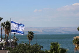 An Israeli flag flying over Lake Tiberias in the Galilee. (Photo: Wikimedia)