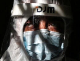 A Palestinian medical worker wearing protective gear conducting COVID-19 testing inside a mosque in Deir al-Balah, Gaza Strip, on January 11, 2021. (Photo: Ashraf Amra/APA Images)