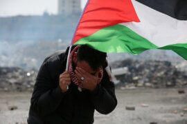Israeli security forces hurls tear gas at the Palestinian youth during clashes with Palestinian protesters following a demonstration against President Donald Trump's Deal of the Century near the settlement of Beit El in the West Bank on February 14, 2020. (Photo by Hamza Shalash/ WAFA/APA Images)
