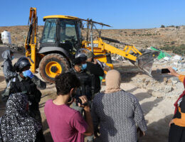 Palestinians gather as Israeli forces demolish the house of Rasmi Abu Aram in Khirber Ar-Rakeez and the house of Hatem Makhamra in Khirbet at-Tuwani, November 25, 2020. (Photo: Mosab Shawer/APA Images)