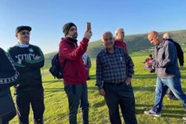 A photo of Bilal Bawatneh, center, that has circulated on social media taken before he was killed by Israeli settlers on a hike in the Jordan Valley.
