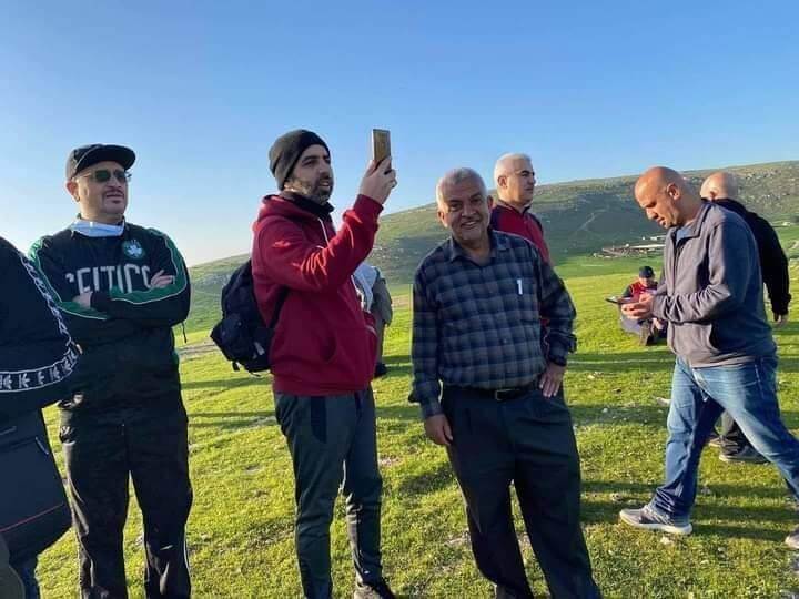 A photo of Bilal Bawatneh, center, that has circulated on social media taken before he was killed by Israeli settlers on a hike in the Jordan Valley.