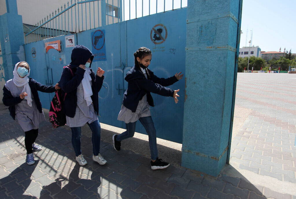 Palestinian students go to school run by the United Nations Relief and Works Agency (UNRWA) in Gaza City, on March 8, 2021. (Photo: Mahmoud Ajjour/APA Images)