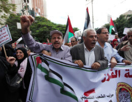 Palestinian supporters of the DFLP, PFLP, the National Initiative, the People's Party, and the Palestinian Democratic Union take part in a march to support the Palestinian reconciliation efforts between Fatah and Hamas and against the deal of the century, in Gaza City on October 27, 2018. (Photo: Mahmoud Ajjour/APA Images)