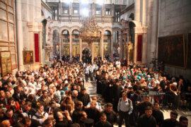 Orthodox Christians take part in the Easter "Holy Fire" celebrations on the eve of Easter Sunday on April 23, 2011, at the Church of the Holy Sepulchre, built over the sites where Christians believe Christ was crucified and buried in Israeli annexed east Jerusalem's Old City. (Photo: Sliman Khader/APA Images)