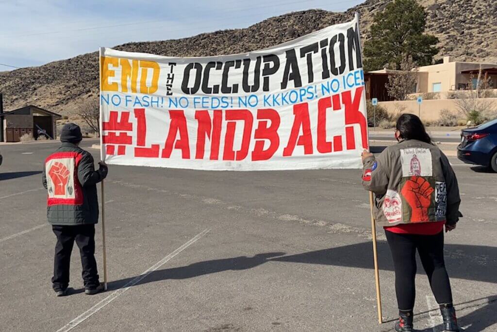 Members of The Red Nation protesting an attack by a National Park Service Ranger on Darrell House, a member of the Diné and Oneida nations, at the Petroglyph National Park in Tiwa Territory (Albuquerque, NM). (Photo: Twitter/ @The_Red_Nation)