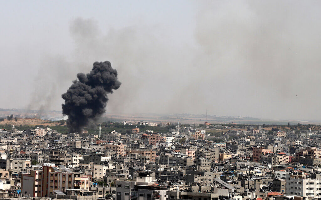 Smoke rises after an Israeli airstrike in Gaza City on May 11, 2021. (Photo: Omar Ashtawy/APA Images)