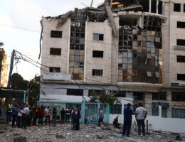 Palestinians in front of the Ministry of Health headquarters following an Israeli airstrike in Gaza City on May 17, 2021. (Photo: Naaman Omar/APA Images)