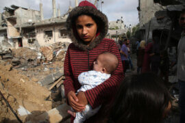 Palestinians return to their houses which were destroyed by Israeli airstrikes in Beit Hanoun, in the northern Gaza Strip, after a ceasefire brokered by Egypt between Israel and Hamas, on May 21, 2021. (Photo: Ashraf Amra/APA Images)