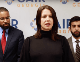 Abby Martin (center) in a press conference detailing the lawsuit, along with representatives of CAIR and PCJF (Photo: Empire Files/Youtube)