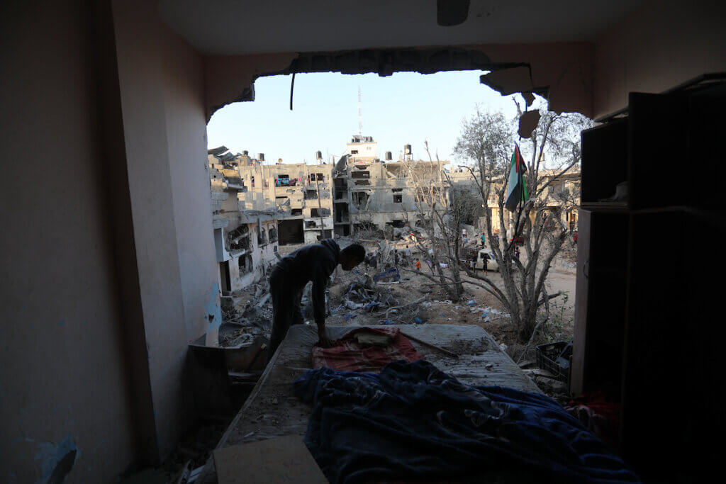 Palestinians return to their homes that were destroyed last month by Israeli airstrikes, in Beit Hanoun in the northern Gaza Strip on June 1, 2021. Gaza. (Photo: Ashraf Amra/APA Images)