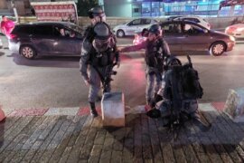 Israeli border police arresting a man in Nazareth, May 2021 (Photo: anonymous)
