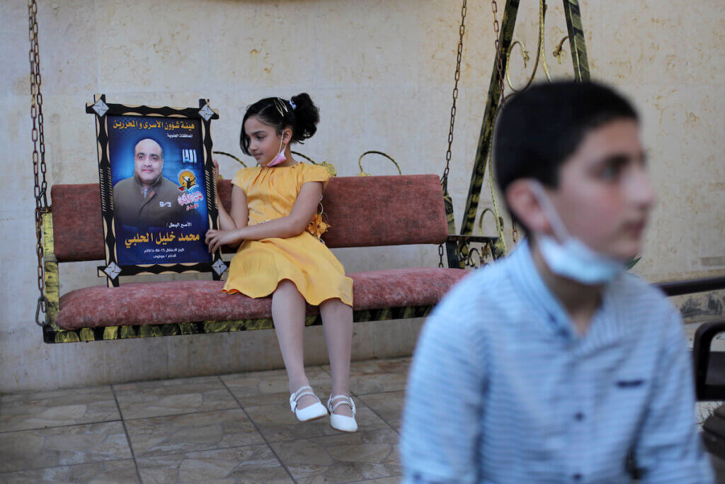 Mohammed el-Halabi's family inside their home in Gaza City on April 22, 2021. (Photo by Mahmoud Ajjour/APA Images)