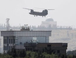 A U.S. helicopter flies near the U.S. Embassy in Kabul, Afghanistan, Sunday, Aug. 15, 2021. Helicopters were landing at the U.S. Embassy in Kabul as diplomatic vehicles left the compound amid the Taliban advanced on the Afghan capital. (Photo: AP Photo/Rahmat Gul)