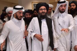 Taliban co-founder Mullah Abdul Ghani Baradar leaves after signing an agreement with the United States during a ceremony in the Qatari capital Doha on February 29, 2020.
