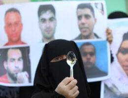 Palestinians take part in a protest to show solidarity with prisoners held in Israeli jails, in Khan Younis in the southern of Gaza strip, on September 8, 2021. (Photo: Ashraf Amra/APA Images)