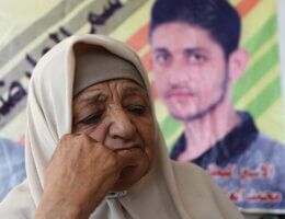 The mother of Mohammed Ardah, who was re-arrested following his escape from Gilboa prison, sits in his family house in the West Bank city of Jenin on September 11, 2021. (Photo: Stringer/APA Images)