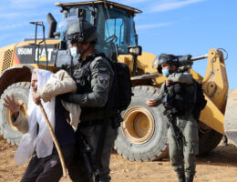 Palestinians protest as Israeli forces demolish a Palestinian house in in Masafer Yatta near Hebron in the Israeli-occupied West Bank November 25, 2020. (Photo: Mosab Shawer/APA Images)
