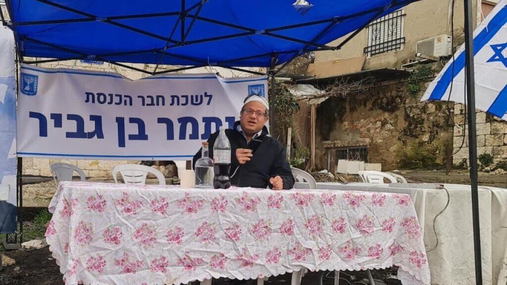 Ben-Gvir sitting under the canopy in his makeshift "office" in occupied East Jerusalem's Sheikh Jarrah neighborhood on February 14, 2022 (Photo: Twitter)