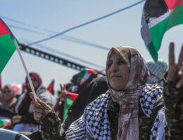 An attendee at the 2022 Land Day celebration in Gaza City. (Photo: Mohammed Salem)