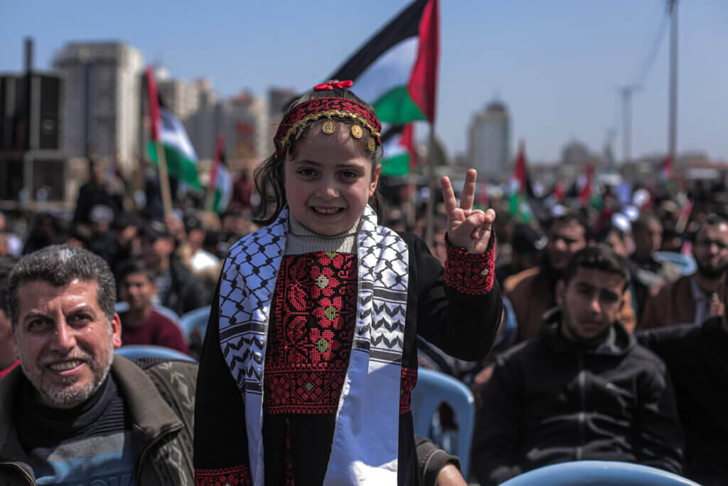 A family attending the 2022 Land Day celebration in Gaza City. (Photo: Mohammed Salem)