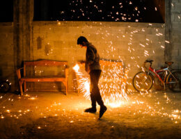 A teen is seen swinging in Arabic ‘silk Jalee’, a kitchen cleaning tool that when lit on fire and swung, sends sparks in all directions. A sight only seen during the month of Ramadan. Beit Hanoun, Gaza, April 2, 2022