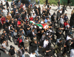 Palestinians carry the body of Mohammad Zakarneh, 17, who died of injuries sustained a day earlier during a raid by Israeli soldiers, during his funeral in the West Bank city of Jenin, on April 11, 2022. (Photo: Ahmed Ibrahim/APA Images)