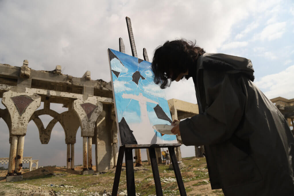 Painting in the ruins of the airport (Photo: Aseel Kabariti)