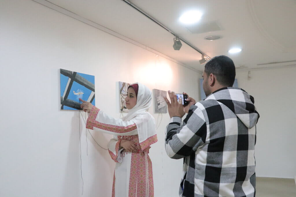 Admiring the exhibit (Photo: Aseel Kabariti)