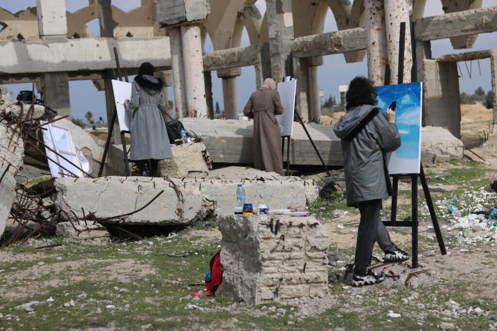 Painting in the ruins of the airport (Photo: Aseel Kabariti)