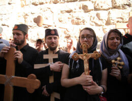 Christian Orthodox pilgrims participate in a procession marking Good Friday on April 18, 2014 in Jerusalem's old city. (Photo: Saeed Qaq/APA Images)