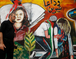 Palestinians paint a mural of veteran Al Jazeera journalist Shireen Abu Akleh near the site where she was killed in Jenin while covering an Israeli army raid in the occupied West Bank, on May 14, 2022. (Photo: Ahmed Ibrahim/APA Images)