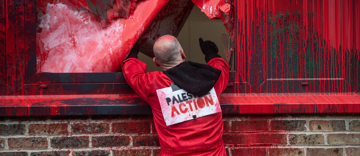Palestine Action activist shutting down Elbit Systems's operational hub in Bristol. (Photo: Guy Smallman)