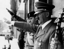 Adolf Hitler, Count Galeazzo Ciano, and Joachim von Ribbentrop attend a Nazi Party rally.