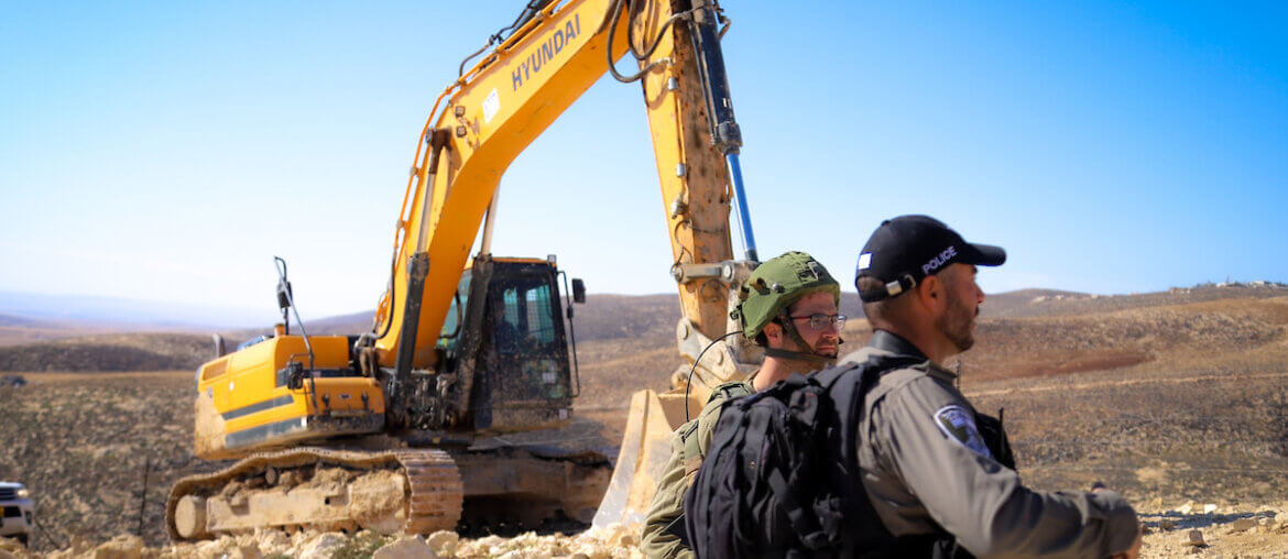 Israeli forces raze four water wells in Masafer Yatta, south of Hebron, in the southern West Bank on February 2, 2022. (Photo: Ihab Alami/APA Images)