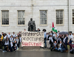 Harvard students pose for Keffiyeh Thursday, PSC's weekly visibility campaign where students wear the traditional scarf in solidarity with the Palestinian cause