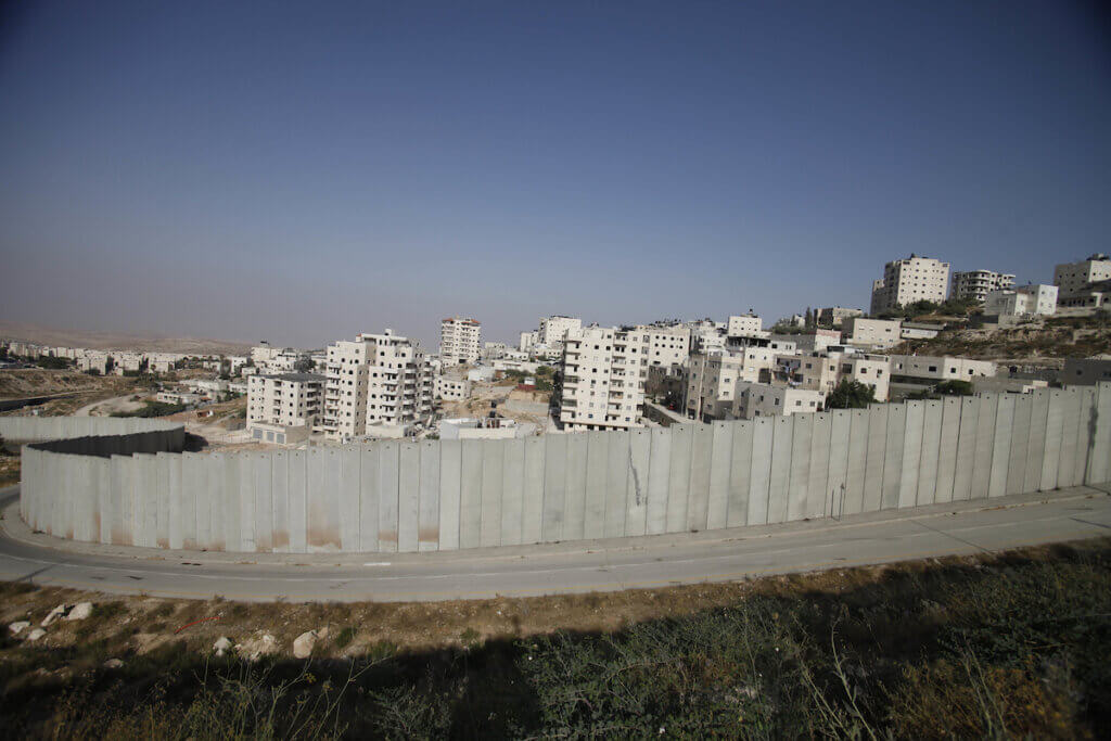 The Israeli separation wall around Jerusalem on July 9, 2013. (Photo: Saeed Qaq/APA Images)