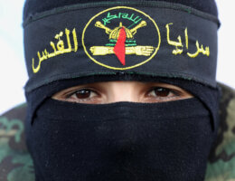 A member of Al-Quds Brigades, the military wing of the Islamic Jihad movement, takes part in condolences for Palestinians who were killed by Israeli air strikes in Rafah in the southern Gaza strip, August 8, 2022. (Photo: Ashraf Amra/APA Images)