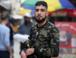 (FILE) A photo shows Ibrahim al-Nabulsi holding his weapon in the West Bank city of Nablus. (Photo by Shadi Jarar'ah/APA Images)